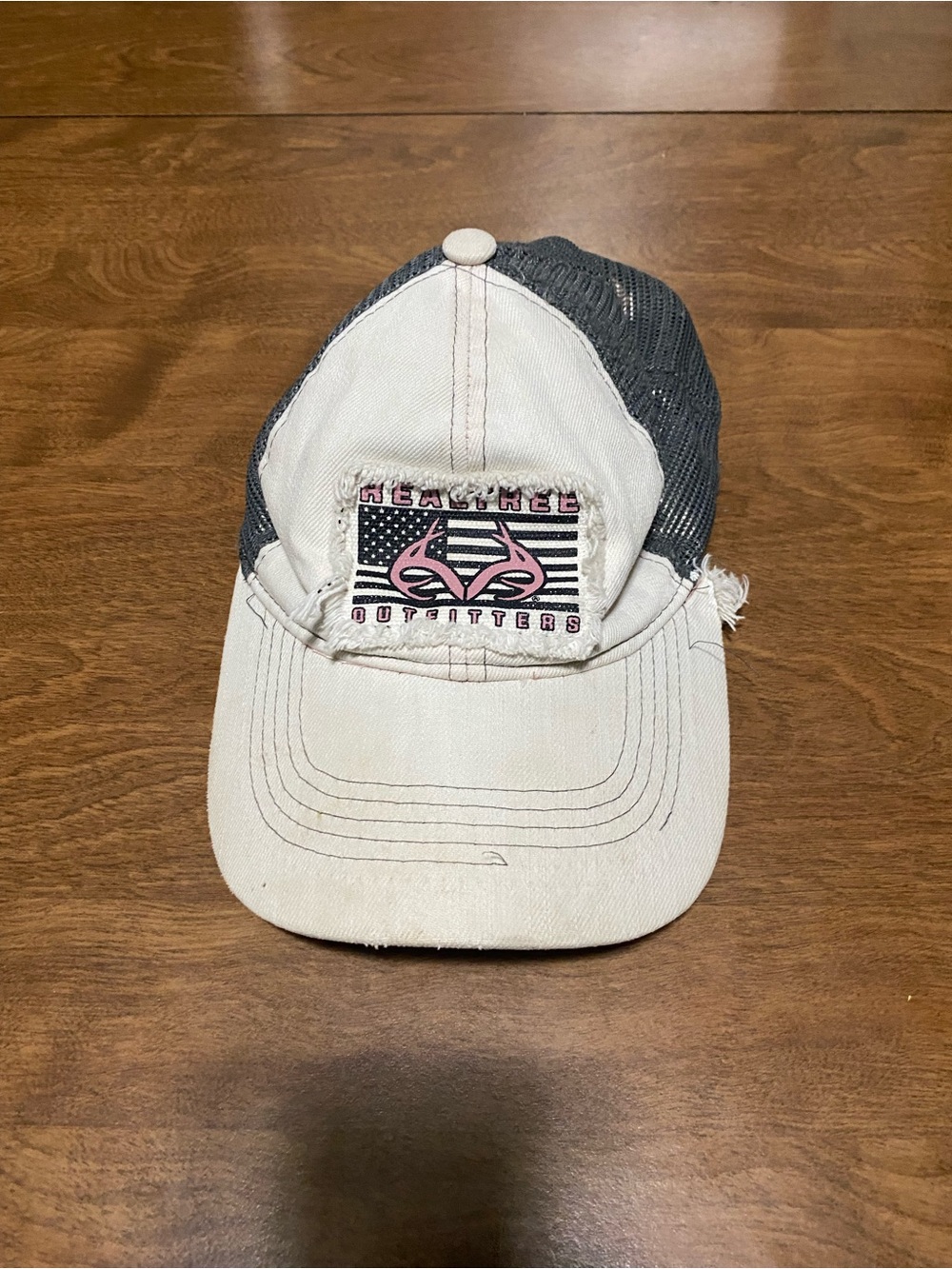 Realtree Beige & Charcoal Trucker Hat with Pink Logo Patch